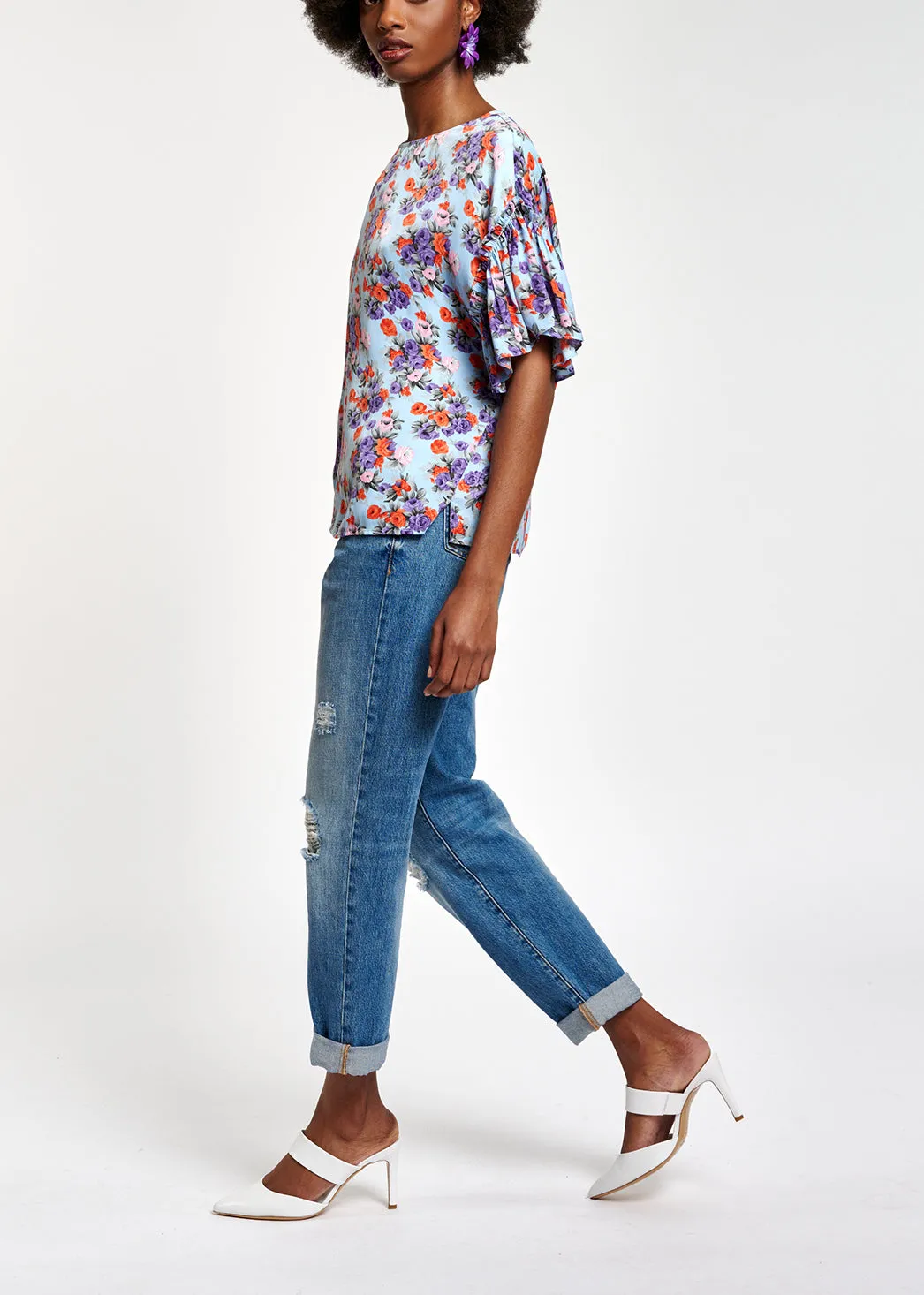 Light blue floral ruffle-sleeved top
