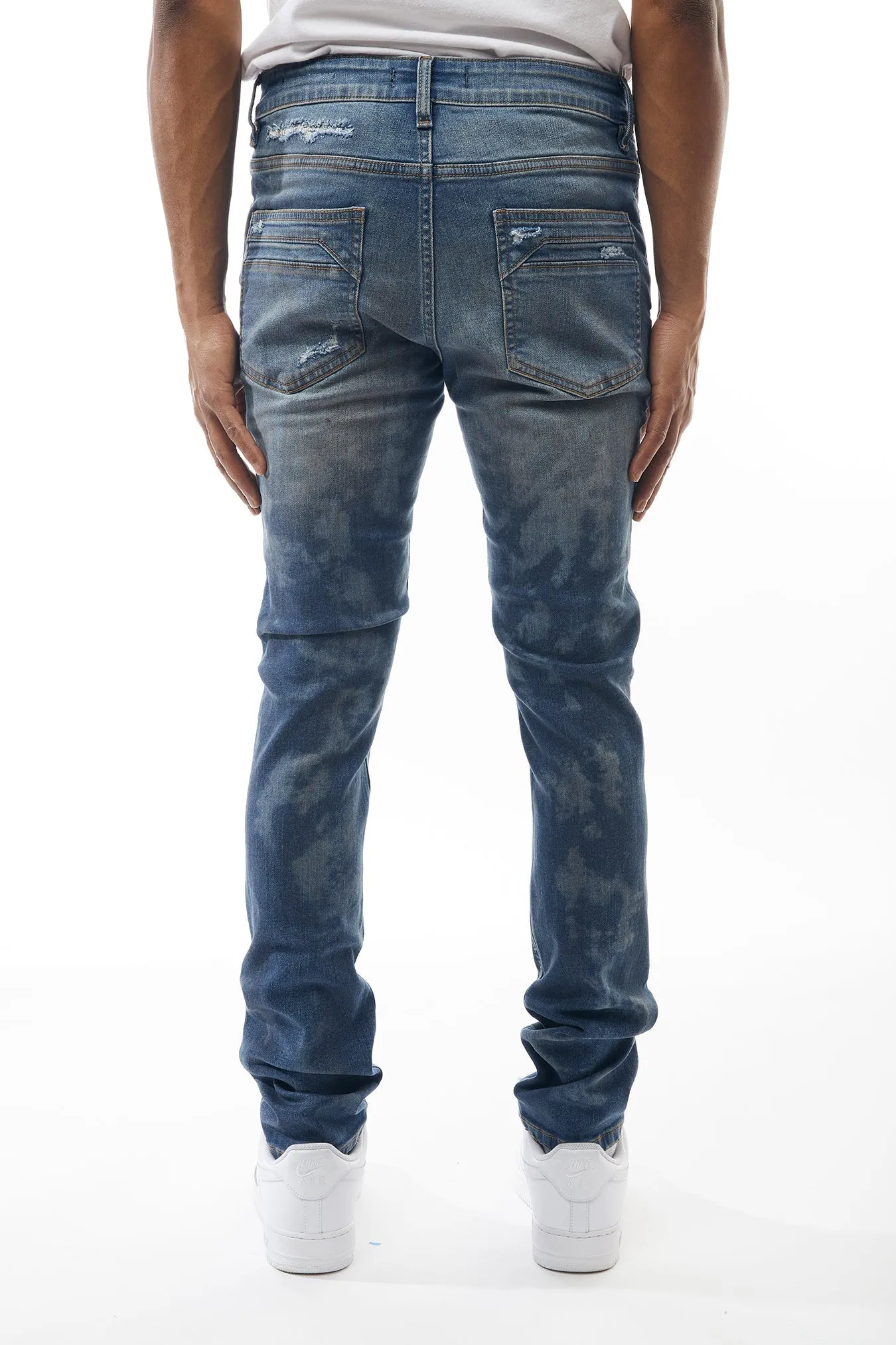 Ripped and Repaired Denim Jeans in Blizzard